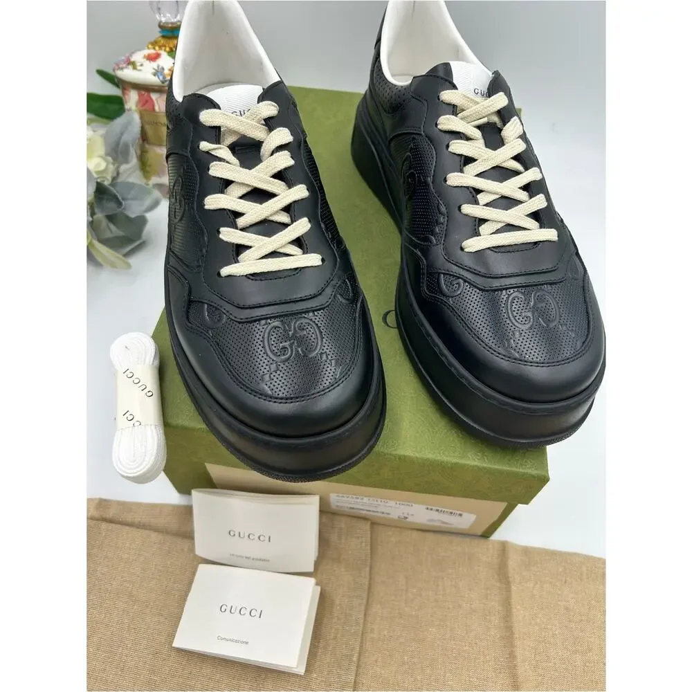 Men's Gucci, GG embossed leather sneakers size 11.5 fits 12 US made in Italy